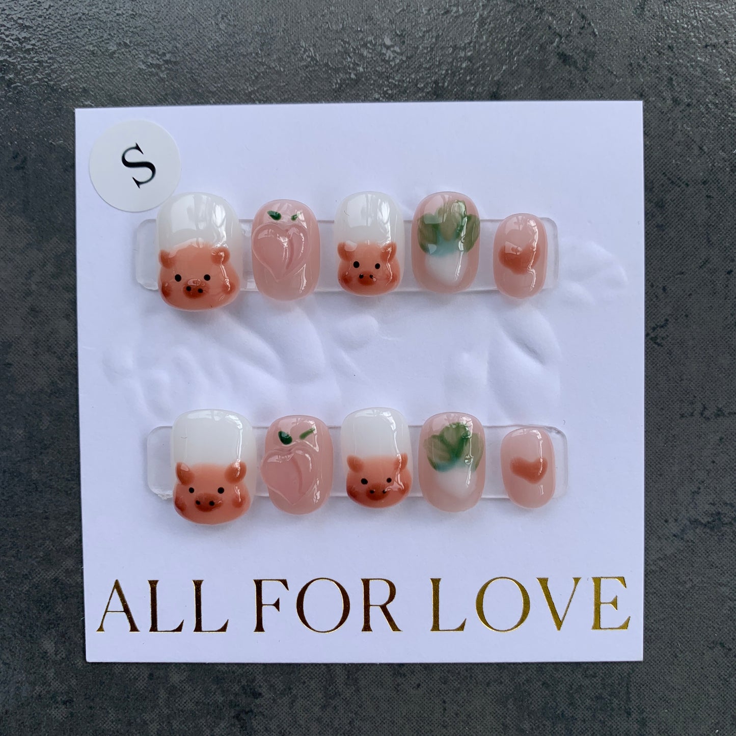 Coco Captivating Nails (A combination of baby pig, peach, vegetable, pink, white)